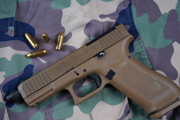 istock Glock 19X 9MM Semi-Auto pistol Threaded Barrel Suppressor 2155576625