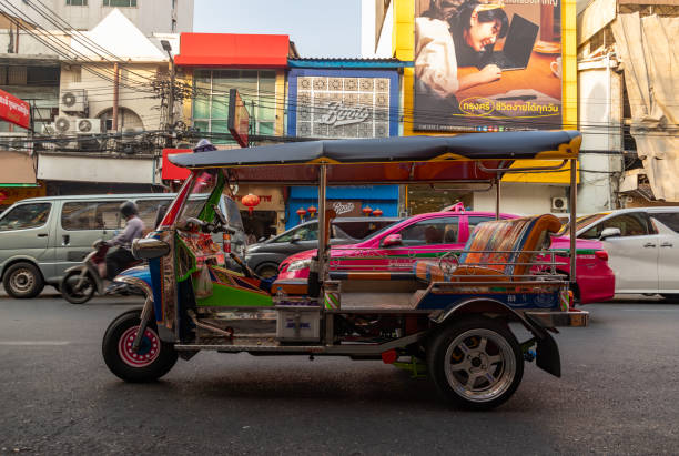 Bangkok, Thailand 01.06.2020: Tuk Tuk, Thai traditional taxis waiting for customers during daylight on the famous Khaosan Road or Khao San Road of Bangkok
