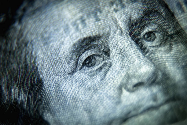 istock Business concept. Close up Benjamin Franklin on one hundred US Dollar bill. 2155577625