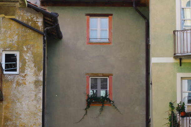 istock facade of three ancient houses 2155579640