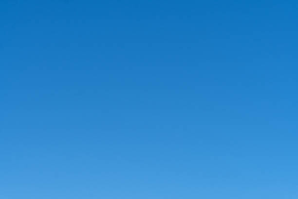 istock Cloudless blue sky background. Light Blue background with clear sky. The beauty of clear blue sky. 2155579956