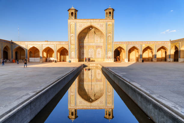 istock Northern iwan reflected in water reservoir, the Vakil Mosque 2155582565