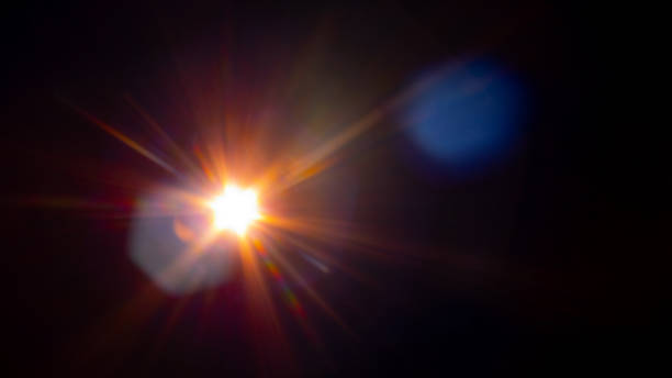 istock Sun flare on the black background 2155582571