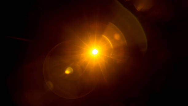istock Abstract Natural Sun flare on the black 2155582659
