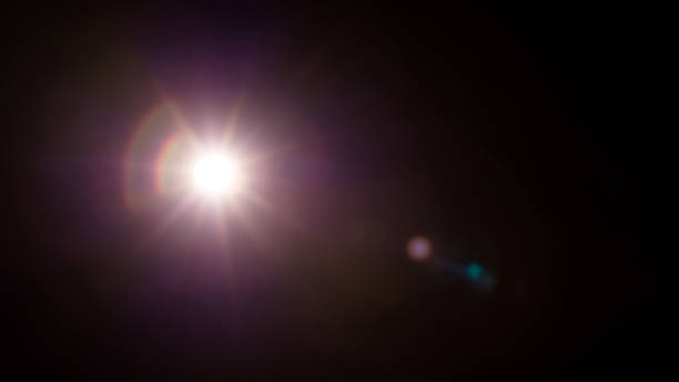 istock Abstract Natural Sun flare on the black 2155582675