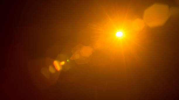 istock Abstract Natural Sun flare on the black 2155582690