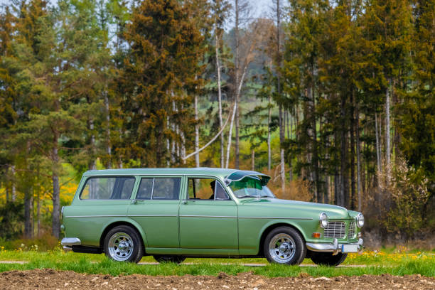 Münsingen, Germany - May 1, 2024: Volvo Amazon station wagon swedish oldtimer vintage car on a country road on a sunny summer day.