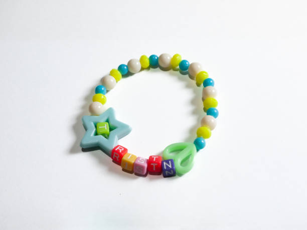 istock Children's bracelet isolated on white background. 2155586040