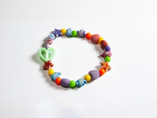 istock Children's bracelet isolated on white background. 2155586049