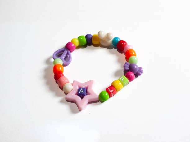 istock Children's bracelet isolated on white background. 2155586056