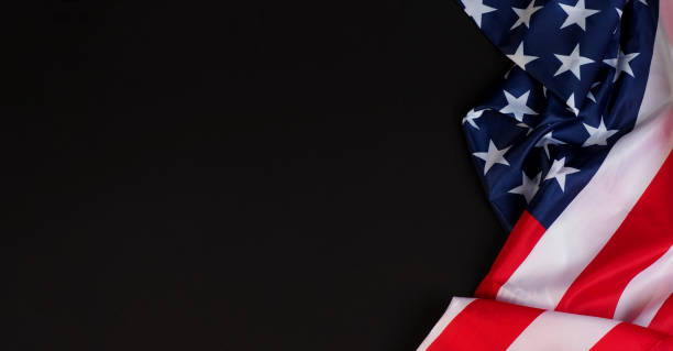 istock USA flag for Independence day on black background 2155586297