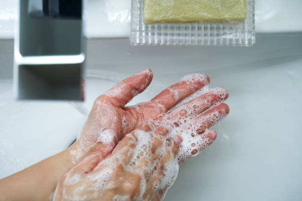 istock The process of washing hands with natural soap over the sink. 2155590614