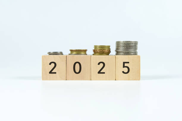 istock 2025 on wooden block with white backgrounds 2155609601
