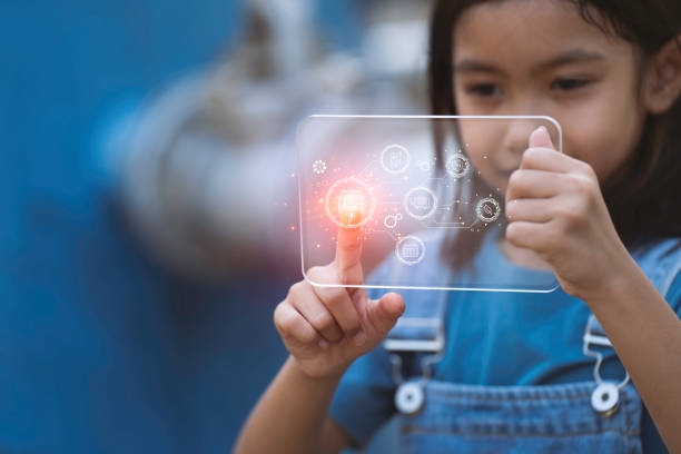 istock Girl touching a virtual screen, girl is studying and learning about machinery, educational technology 2155611672