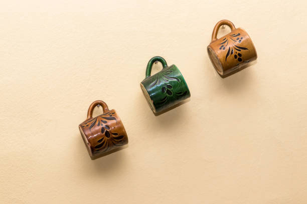 Retro coffee cups hanging on the wall