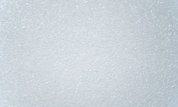 istock frost crystal on window glass in winter season 2155621075