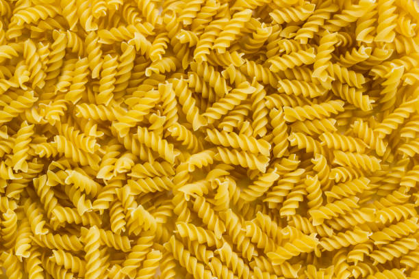 istock Traditional Turkish durum wheat semolina pasta background 2155628535