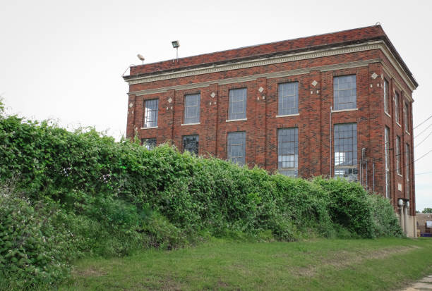Dallas Power Supply A tall, historic brick building that was one of four historic structures that were identical and used for power generation in Dallas, Texas grapevine texas city stock pictures, royalty-free photos & images