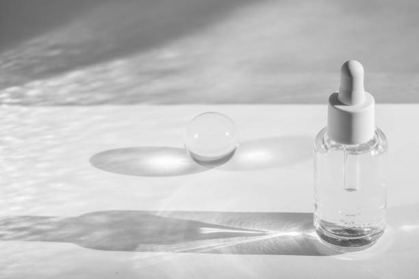 istock Serum bottle with crystal ball in minimalistic setting 2155630898