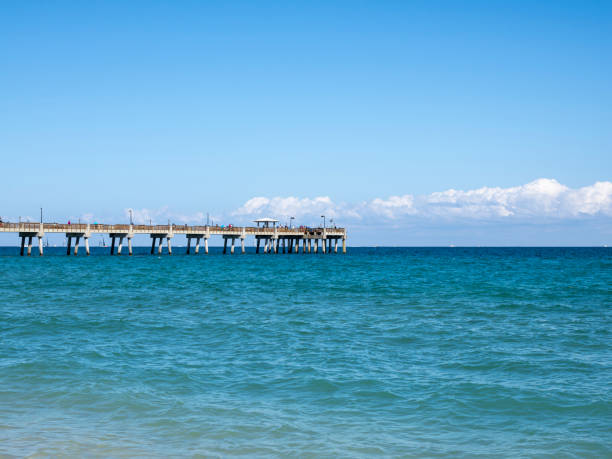Dania Beach Pier in Dania Beach, South Florida is almost 1000 feet long, extending over the Atlantic Ocean.