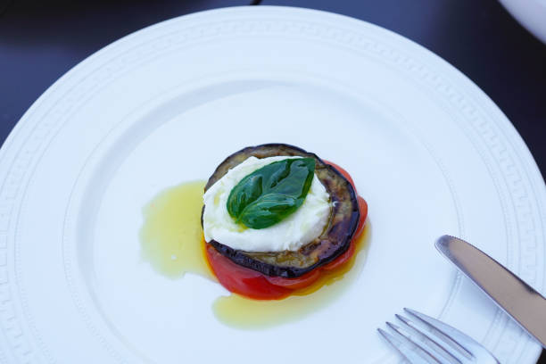 Caprese with tomato, mozzarella cheese and eggplant, top view