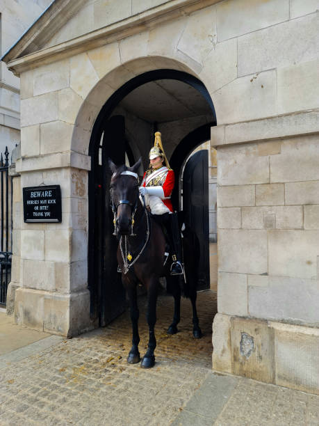 London, UK - February 7 2022: Household Cavalry mounted guard on duty at Horse Guards building in Westminster.