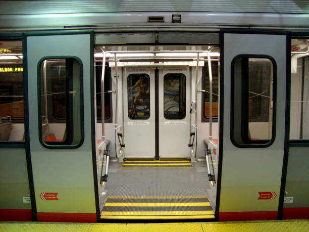 San Francisco - April 20, 2010: An empty MUNI subway car with open doors waiting at a station platform.
