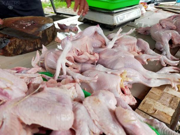 istock Fresh chicken meat at a chicken seller 2155652534