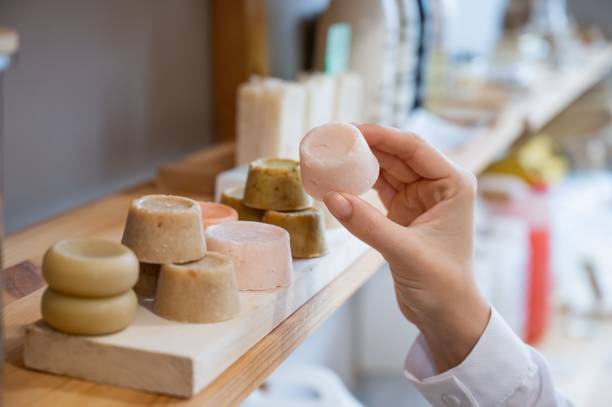 istock Woman chooses organic soap in eco friendly store. 2155659785