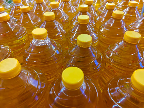 istock Cooking oil in plastic bottles displayed on a supermarket counter 2155662642