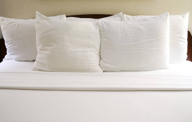 istock close up on pillows on the bed 2155670436