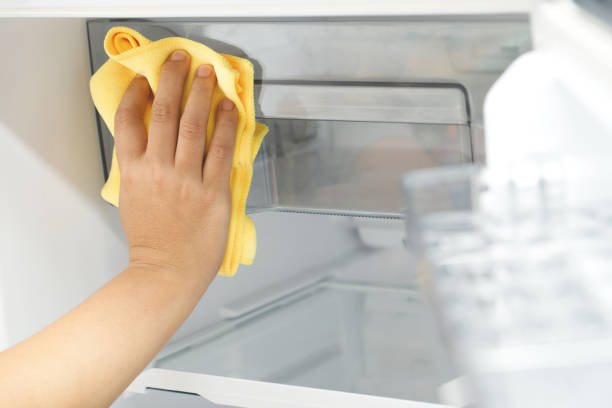 istock Employees use a cloth to clean the refrigerator. 2155672748