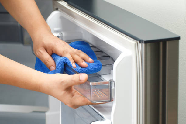 istock Employees use a cloth to clean the refrigerator. 2155672751