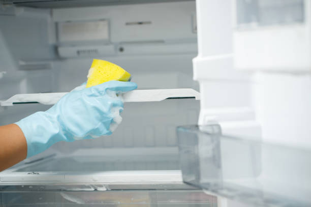 istock Employees use a cloth to clean the refrigerator. 2155672775