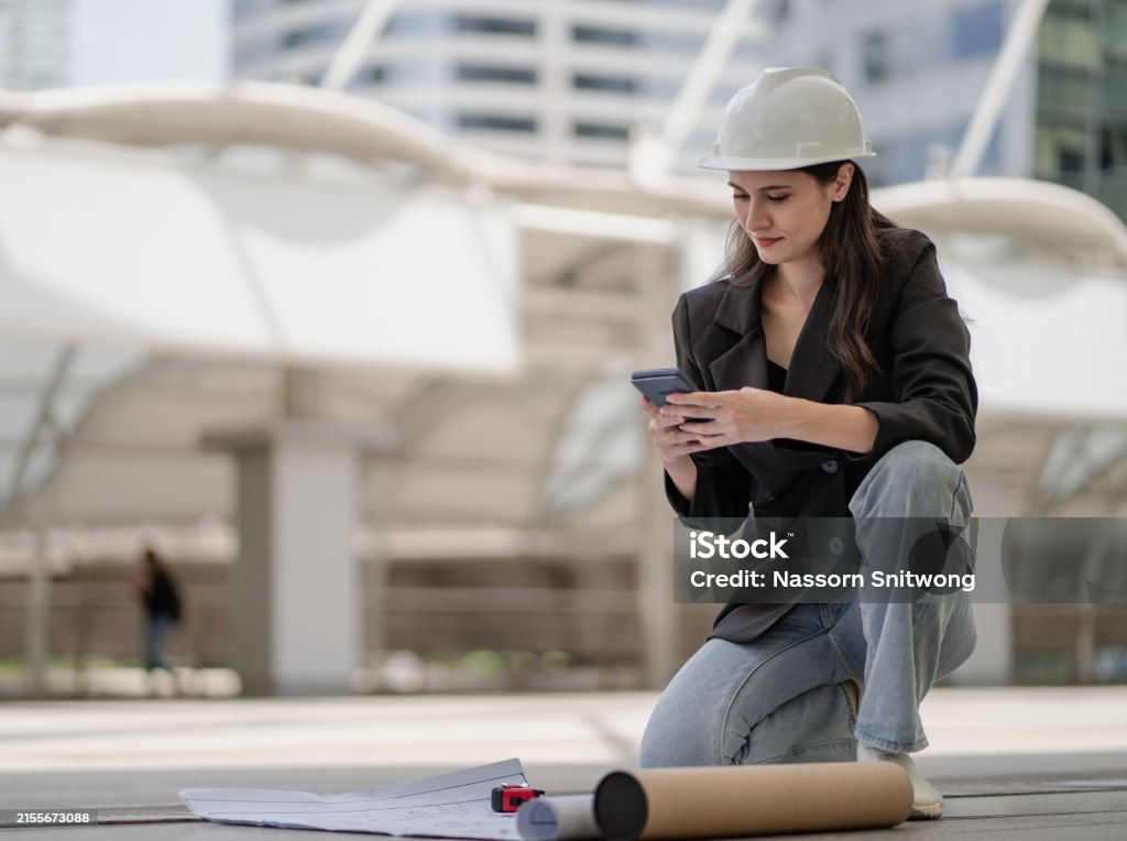 Spring Property Engineer Female Property Development Engineer Reading Blueprint And Plan ...