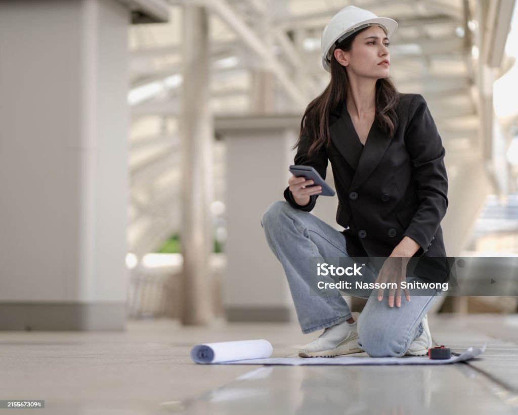 Building Developer Woman Female Property Development Engineer Reading Blueprint And Plan ...