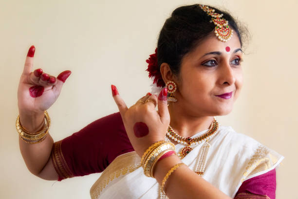 istock Indian classical dancer in close up demonstrating Bharatanatyam dance mudra poses. 2155674418