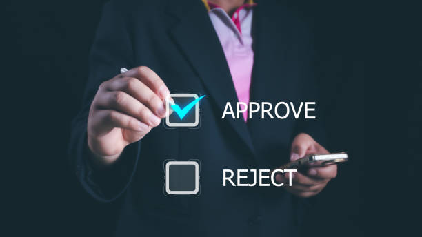 istock Approved, accept, pass inspection, Businessman writing or tick correct mark to approve document and project concept. Management, manager, examine, survey, tick, certification, business, technology. 2155675590