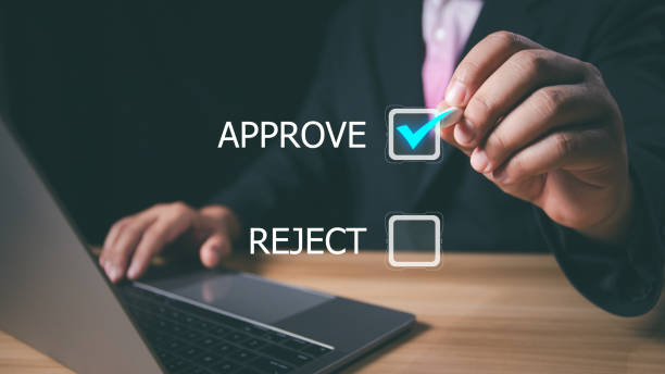 istock Approved, accept, pass inspection, Businessman writing or tick correct mark to approve document and project concept. Management, manager, examine, survey, tick, certification, business, technology. 2155675592