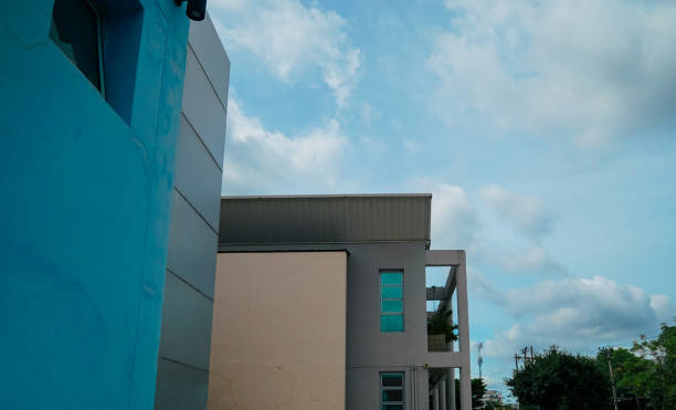 istock A blue building with a grey roof and a white wall 2155677748