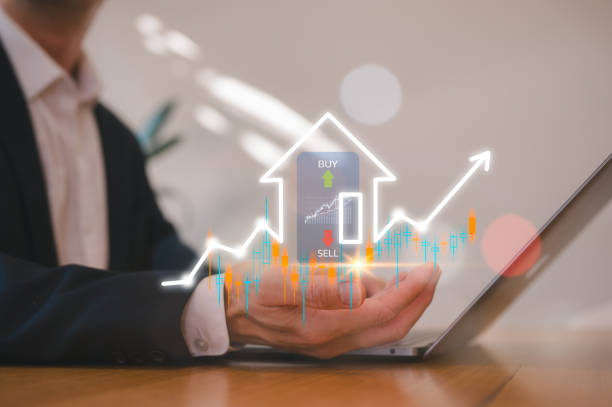 istock businessman using computer laptop working with real estate investment concept, energy efficiency rating and property value, Real estate online on virtual screen. home search land price property tax 2155678395