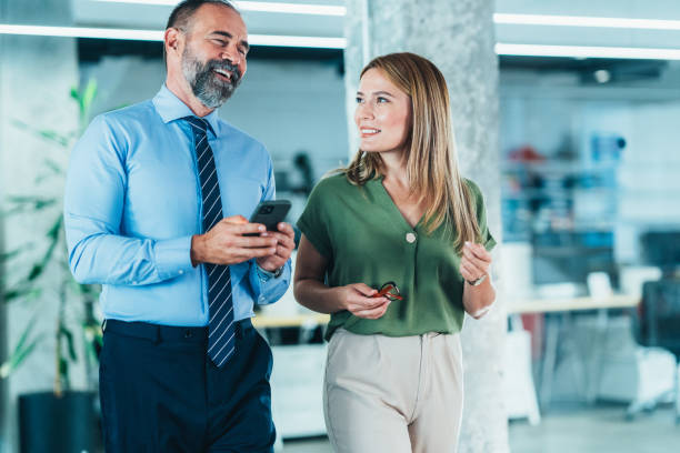 istock Business colleagues talking in the office 2155679630