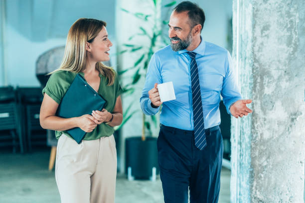 istock Business colleagues talking in the office 2155679631