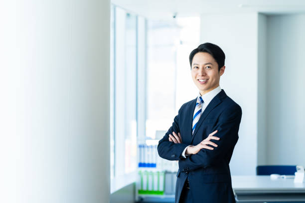 istock business person working in office 2155679990
