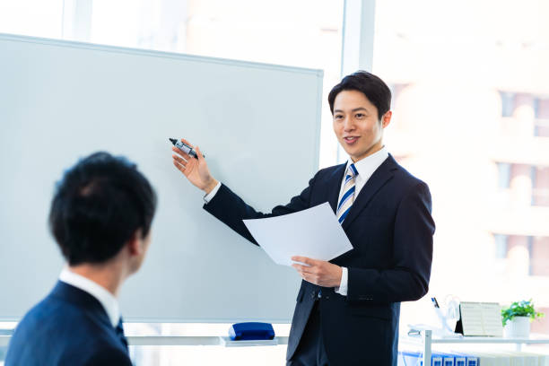 istock Business people having a meeting in a conference room 2155680017