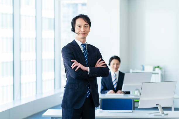istock Businessman working at a call center 2155680093