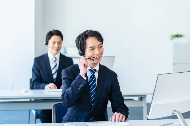istock Businessman working at a call center 2155680341
