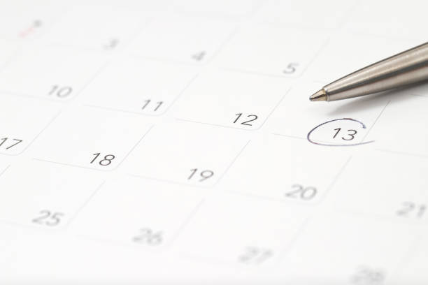 istock A pen with calendar mask on the 13th 2155681473