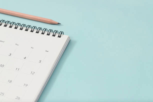 istock calendar on the blue. empty copy space for text. concept for busy timeline organize schedule,appointment and meeting reminder. planning for business meeting or travel holiday planning concept. 2155681474