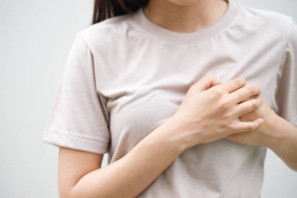 istock young woman with pain 2155682416